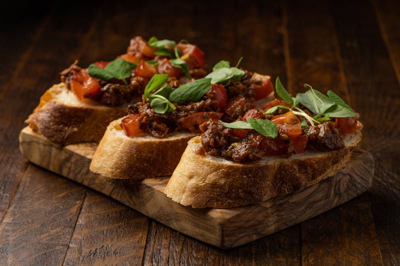 Classic bruschetta with fresh tomatoes and basil on toasted bread