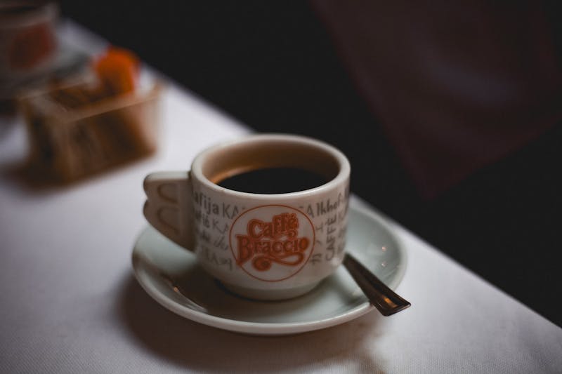 Rich Italian espresso coffee served in traditional cup